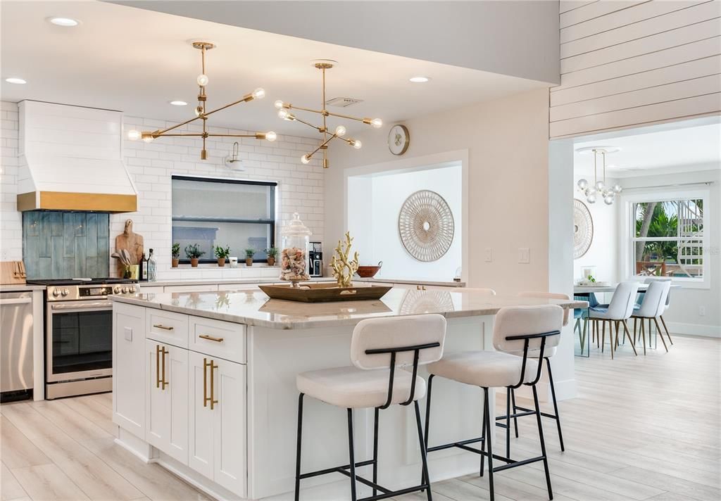 Dining room, Interior, Kitchen, Pendant Lights, Recessed Lighting, Stainless Steel Appliances, Stone Walls, Wood Texture Flooring