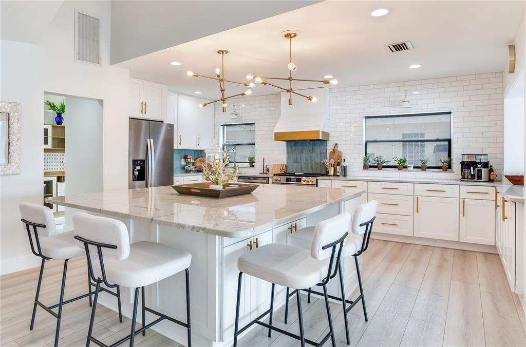 Interior, Kitchen, Pendant Lights, Recessed Lighting, Stainless Steel Appliances, Stone Walls, Wood Texture Flooring