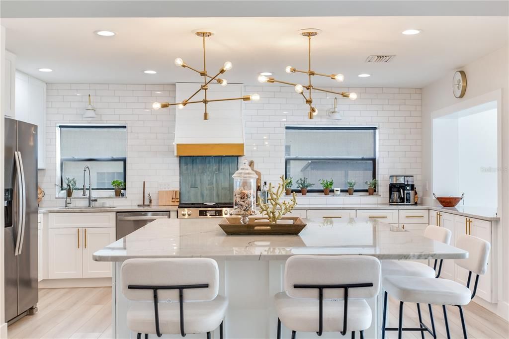 Interior, Kitchen, Pendant Lights, Recessed Lighting, Stainless Steel Appliances, Stone Walls, Wood Texture Flooring