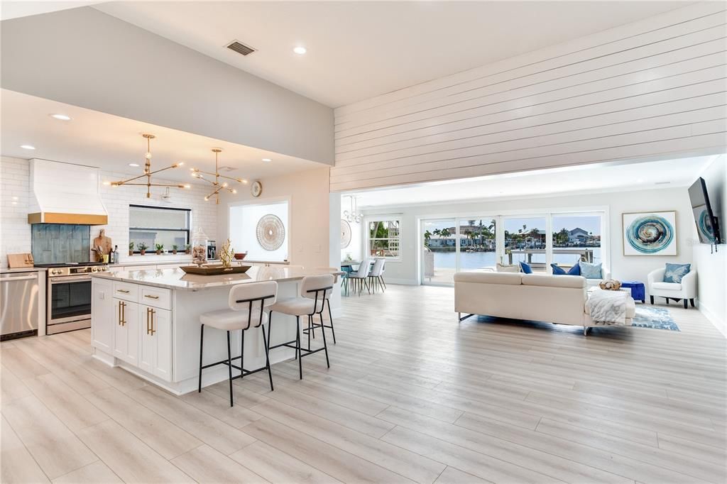 Interior, Kitchen, Living room, Pendant Lights, Recessed Lighting, Stainless Steel Appliances, Water, Wood Texture Flooring