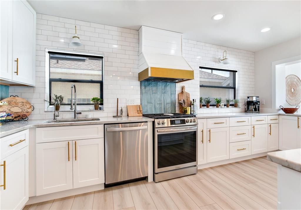 Interior, Kitchen, Recessed Lighting, Stainless Steel Appliances, Stone Walls, Wood Texture Flooring