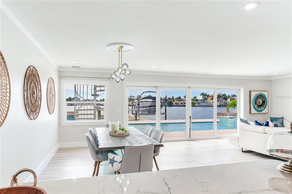 Dining room, Interior, Living room, Pendant Lights, Recessed Lighting, Water, Wood Texture Flooring