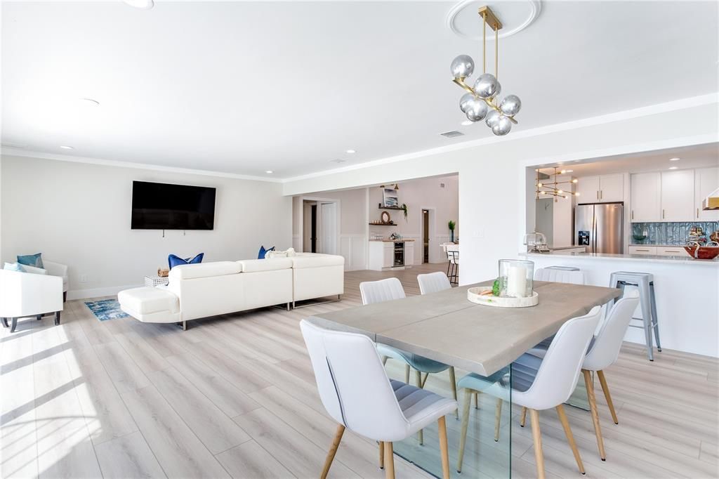 Dining room, Interior, Kitchen, Living room, Pendant Lights, Recessed Lighting, Stainless Steel Appliances, Wood Texture Flooring