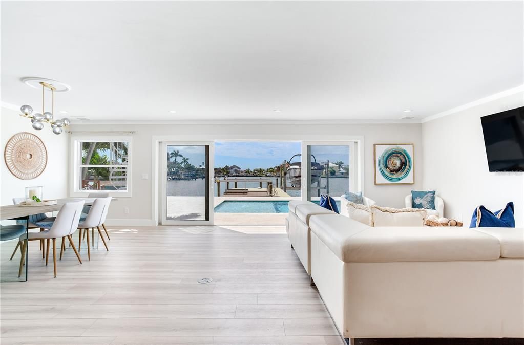 Dining room, Interior, Living room, Pendant Lights, Recessed Lighting, Water, Wood Texture Flooring