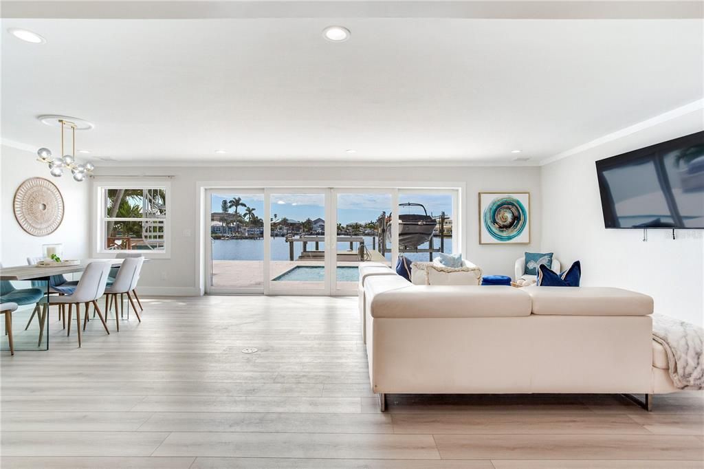 Dining room, Interior, Living room, Pendant Lights, Recessed Lighting, Water, Wood Texture Flooring