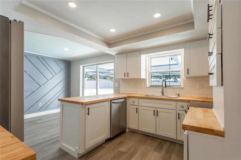 Interior, Kitchen, Recessed Lighting, Stainless Steel Appliances, Wood Texture Flooring