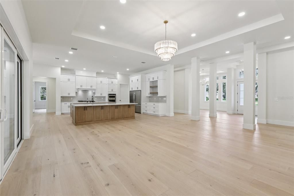 Chandelier, Interior, Kitchen, Recessed Lighting, Stainless Steel Appliances, Wood Texture Flooring