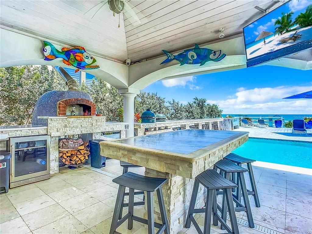 Exterior, Fireplace, Outdoor Kitchen, Pool, Water