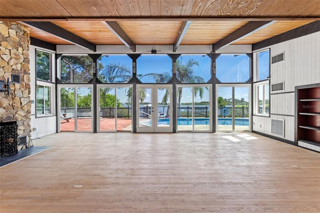 Empty room, Fireplace, Interior, Stone Walls, Sun Room, Wooden Beams, Wooden Ceilings, Wood Texture Flooring
