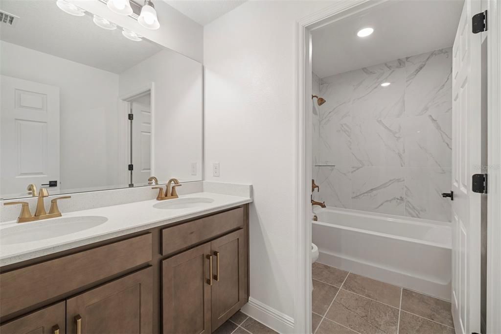 Bathroom, Dual Sink Vanities, Interior, Marble Walls, Recessed Lighting