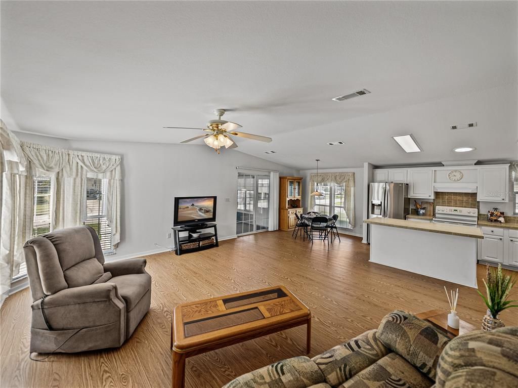 Dining room, Interior, Kitchen, Living room, Pendant Lights, Recessed Lighting, Stainless Steel Appliances, Wood Texture Flooring