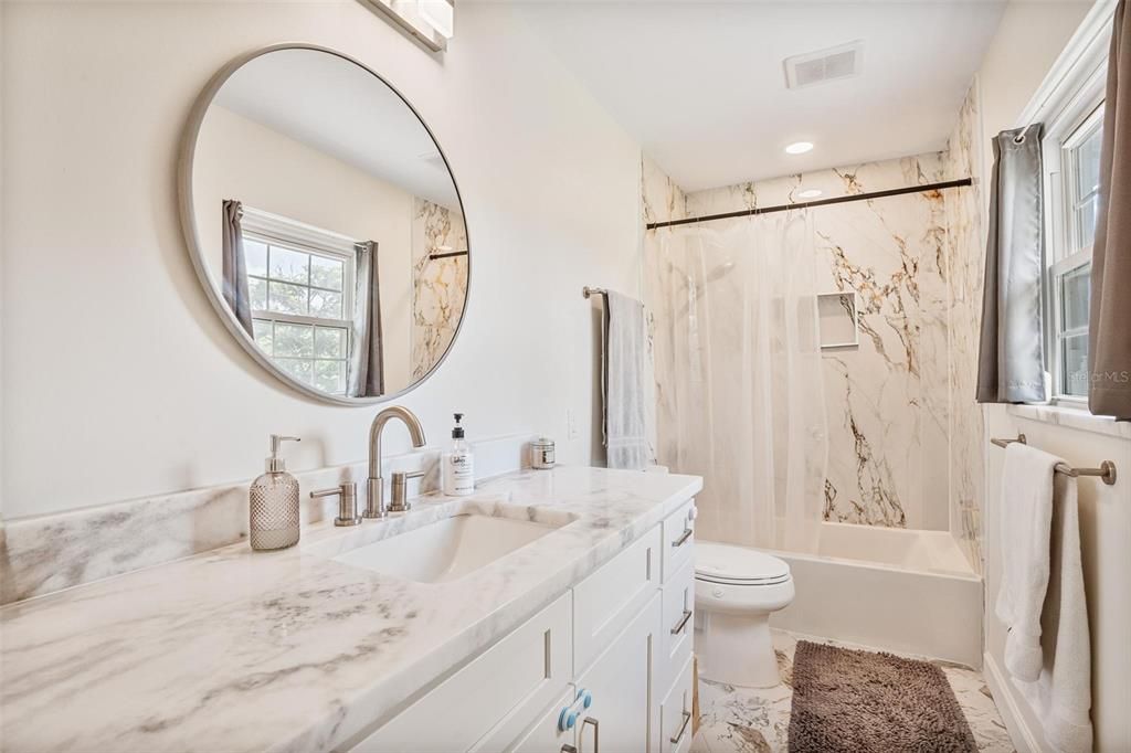 Bathroom, Dual Sink Vanities, Interior, Marble, Marble Walls, Recessed Lighting