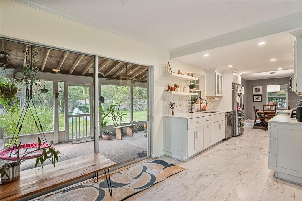 Dining room, Interior, Kitchen, Marble, Pendant Lights, Recessed Lighting, Stainless Steel Appliances, Wooden Ceilings