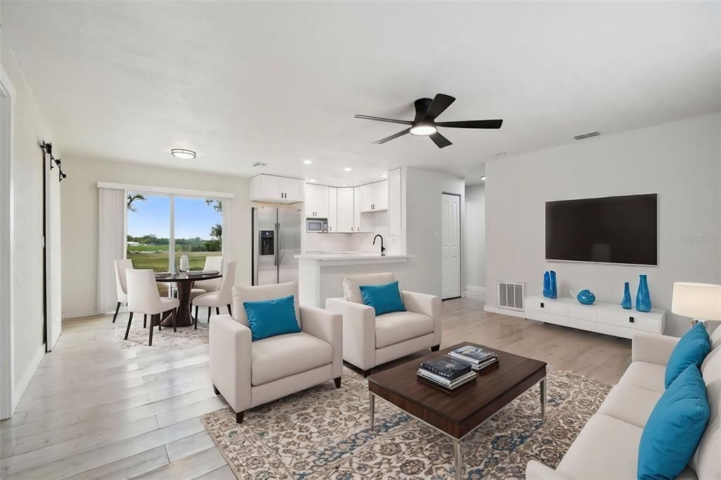Dining room, Interior, Kitchen, Living room, Recessed Lighting, Stainless Steel Appliances, Wood Texture Flooring