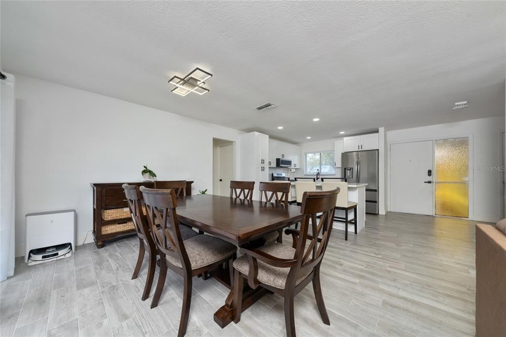 Dining room, Interior, Kitchen, Recessed Lighting, Stainless Steel Appliances, Wood Texture Flooring