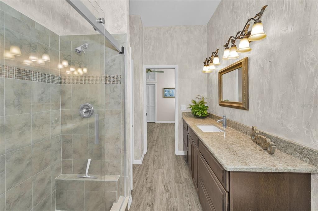 Bathroom, Dual Sink Vanities, Glass Shower, Interior, Wood Texture Flooring