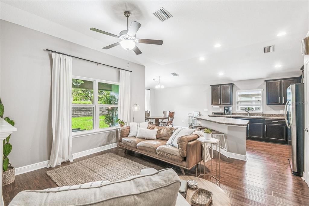Dining room, Interior, Kitchen, Living room, Pendant Lights, Recessed Lighting, Stainless Steel Appliances, Wood Texture Flooring