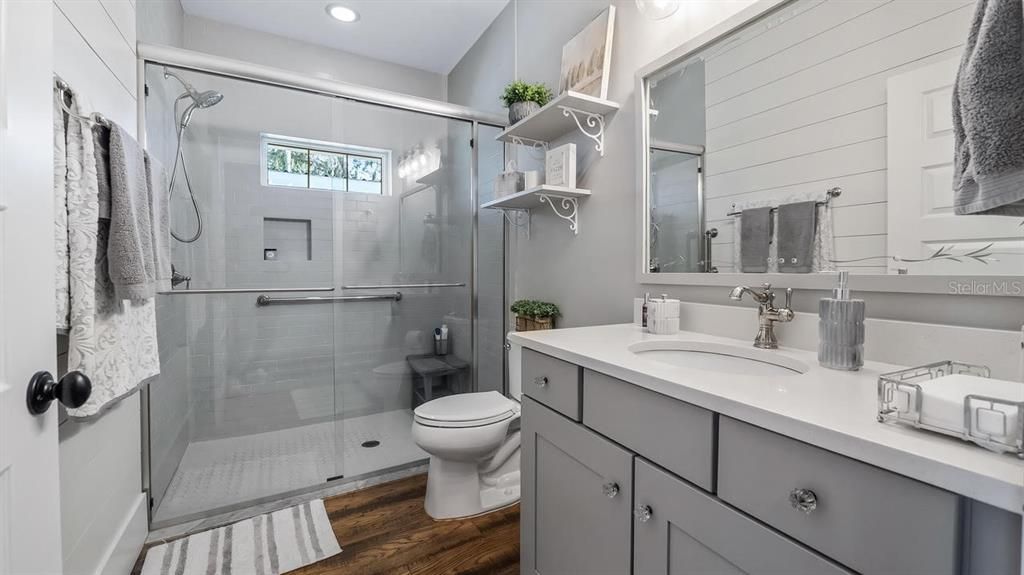 Bathroom, Glass Shower, Interior, Recessed Lighting, Wood Texture Flooring