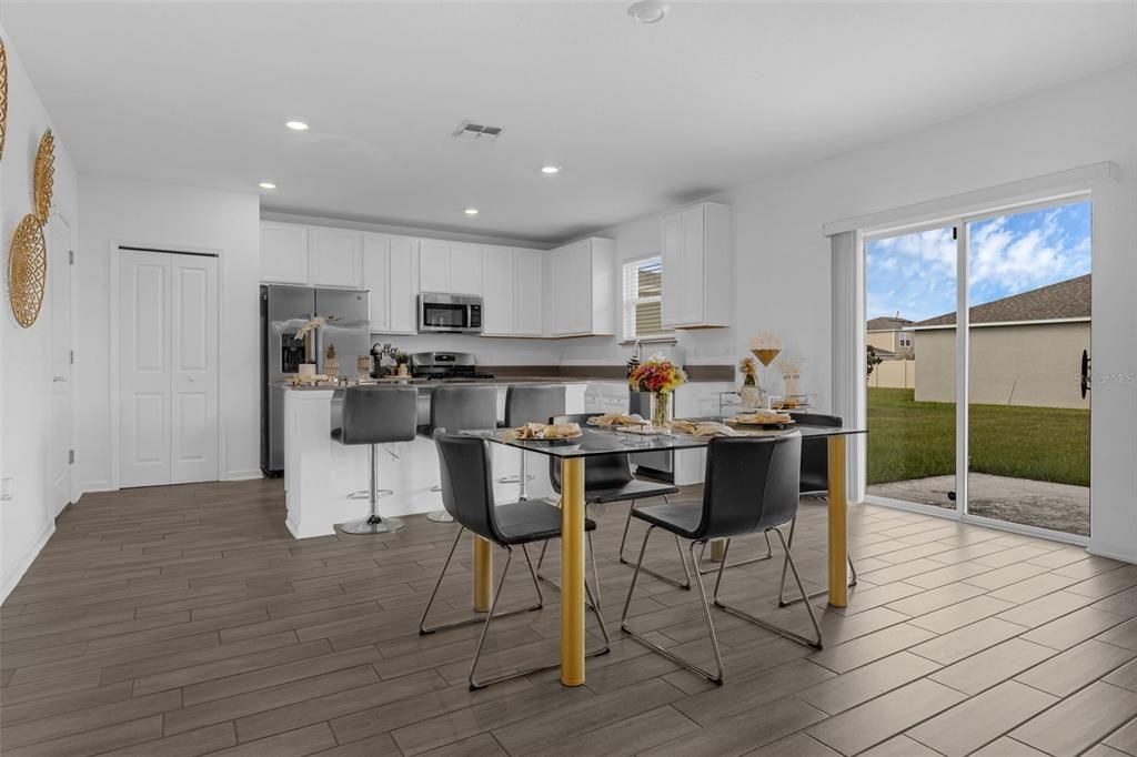 Dining room, Interior, Kitchen, Recessed Lighting, Stainless Steel Appliances, Wood Texture Flooring