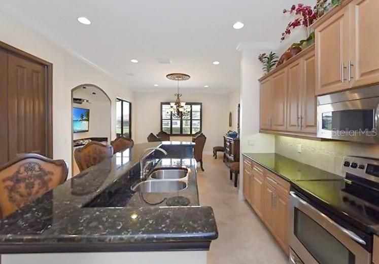 Chandelier, Dining room, Interior, Kitchen, Recessed Lighting, Stainless Steel Appliances