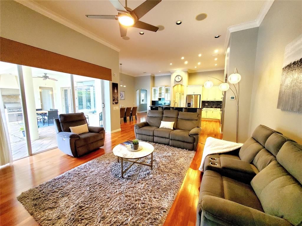 Dining room, Interior, Kitchen, Living room, Recessed Lighting, Stainless Steel Appliances, Wood Texture Flooring