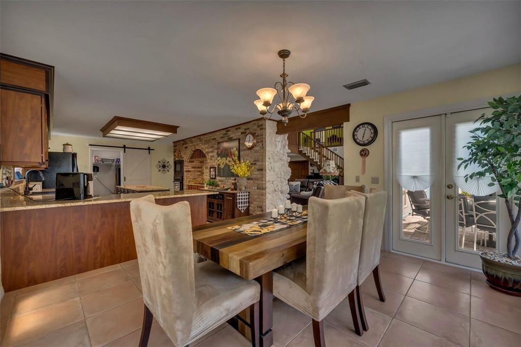 Chandelier, Dining room, Fireplace, Interior, Stone Walls