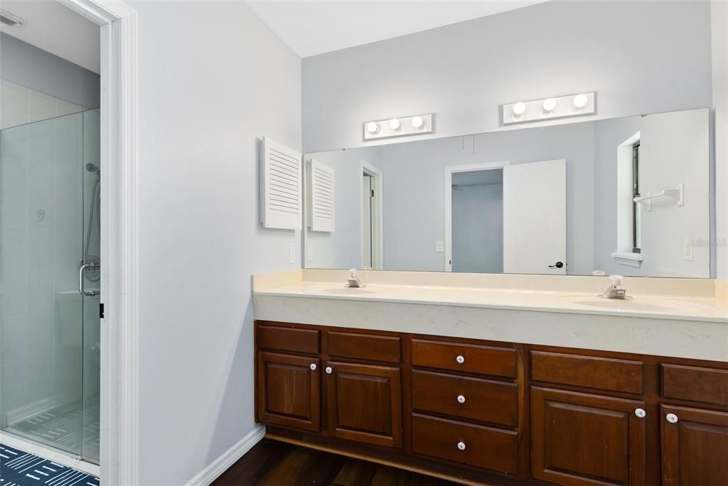 Bathroom, Dual Sink Vanities, Glass Shower, Interior, Wood Texture Flooring