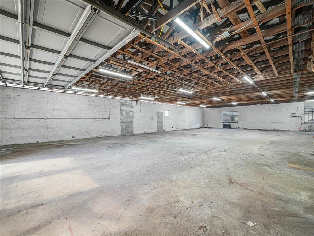 Garage, Interior, Stone Walls, Wooden Beams