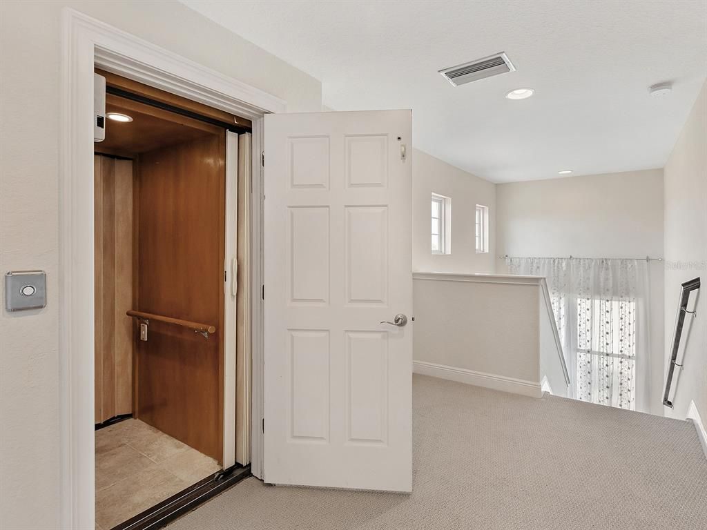 Elevator, Interior, Recessed Lighting, Wooden Walls