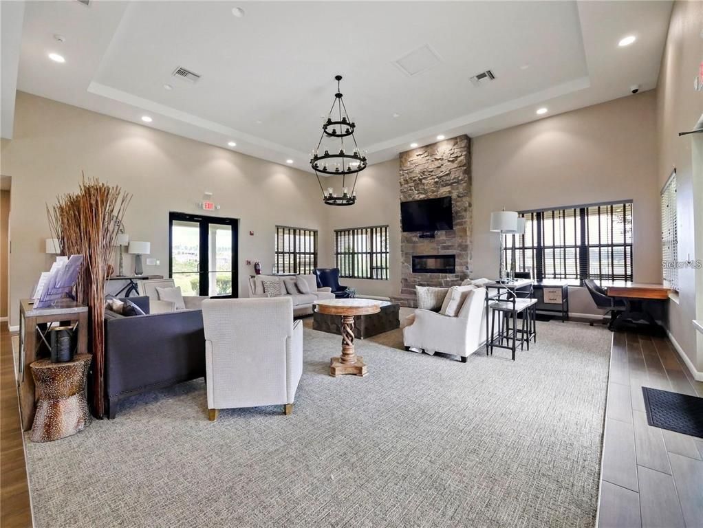 Fireplace, Interior, Living room, Pendant Lights, Recessed Lighting, Stone Walls, Wood Texture Flooring