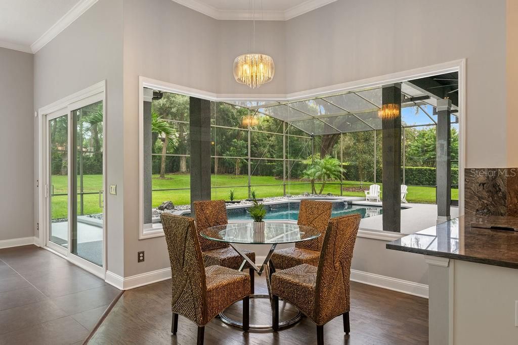 Dining room, Interior, Pendant Lights, Pool, Sun Room, Wood Texture Flooring