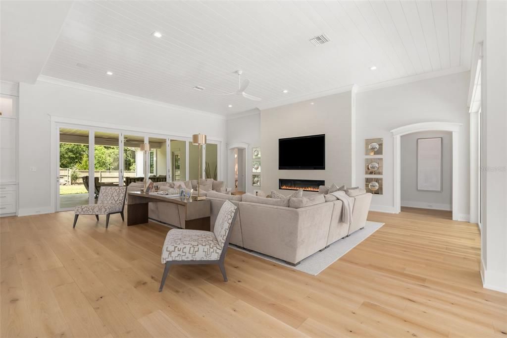 Fireplace, Interior, Living room, Recessed Lighting, Wood Texture Flooring
