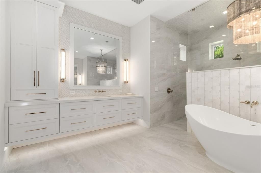 Bathroom, Dual Sink Vanities, Free Standing Baths, Glass Shower, Interior, Marble, Marble Walls, Recessed Lighting