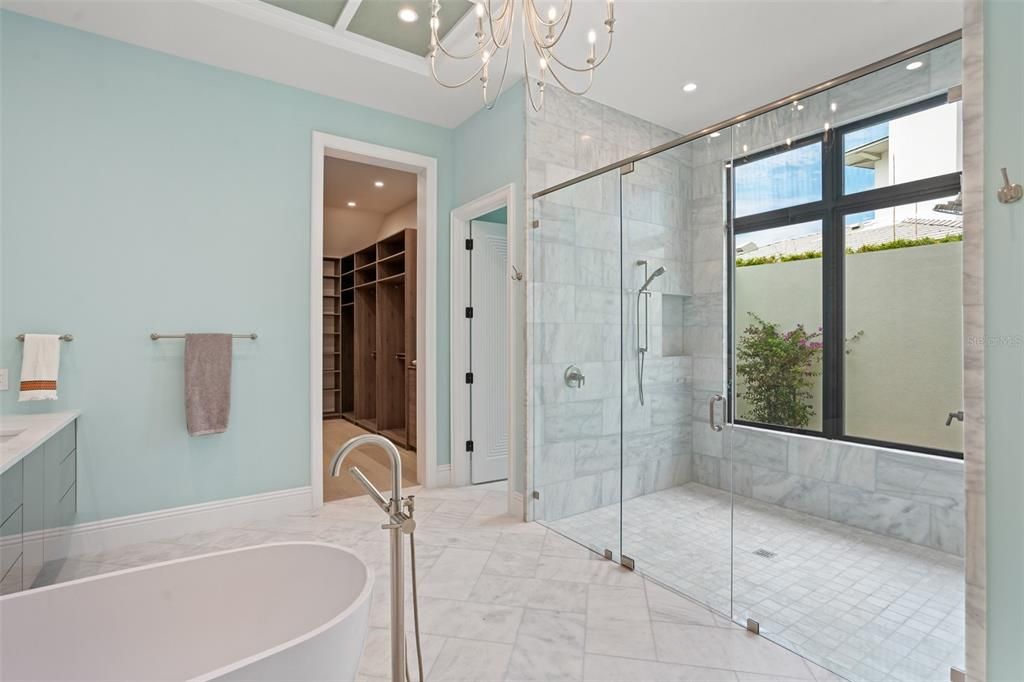Bathroom, Free Standing Baths, Glass Shower, Interior, Marble, Marble Walls, Recessed Lighting