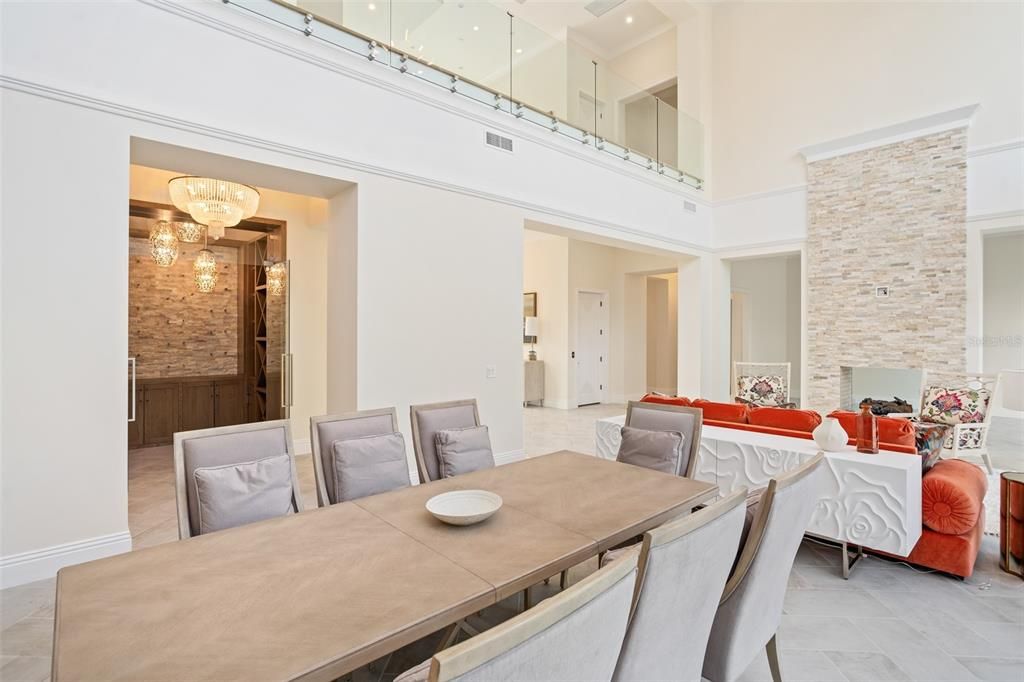 Chandelier, Dining room, Fireplace, Interior, Living room, Stone Walls