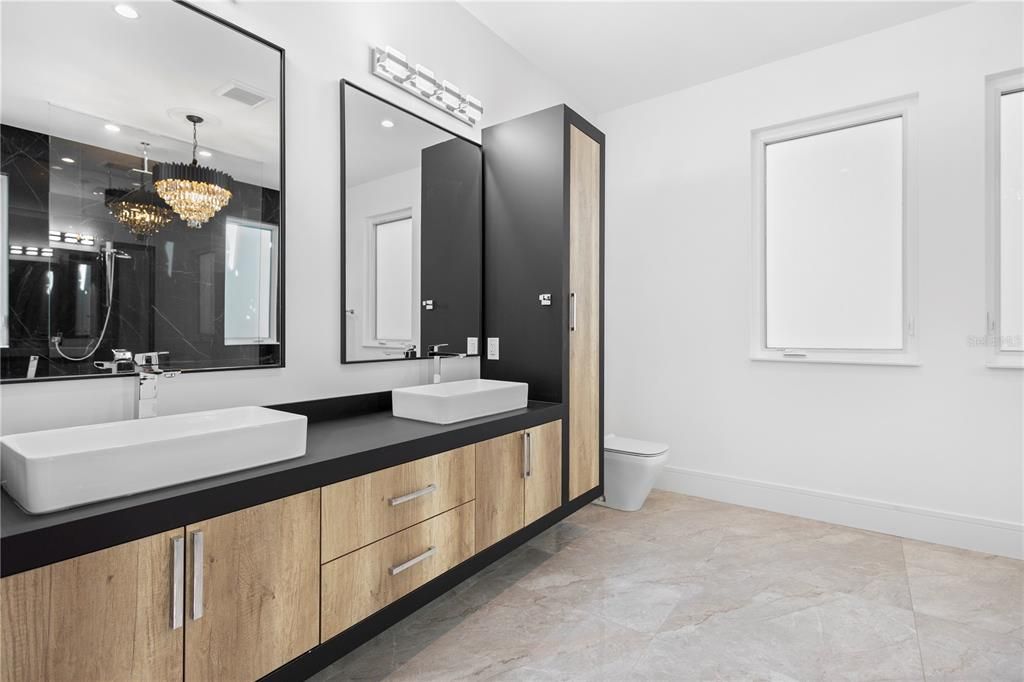 Bathroom, Chandelier, Dual Sink Vanities, Interior, Recessed Lighting