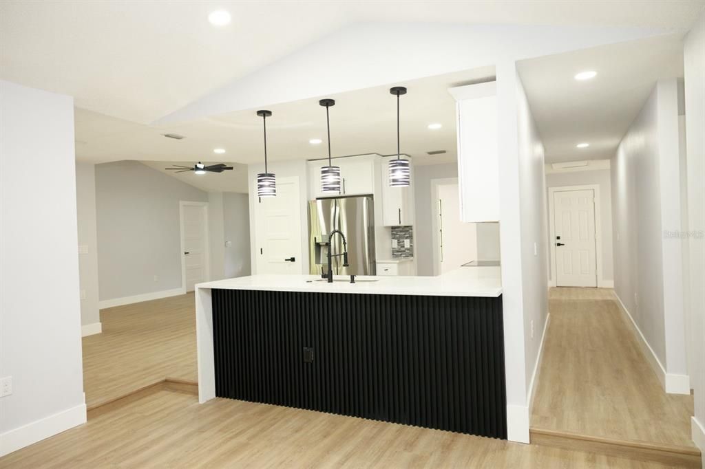 Interior, Kitchen, Pendant Lights, Recessed Lighting, Stainless Steel Appliances, Wood Texture Flooring