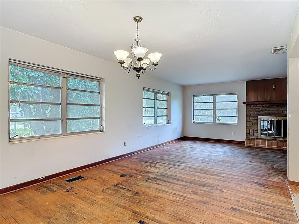 Chandelier, Empty room, Fireplace, Interior, Wood Texture Flooring