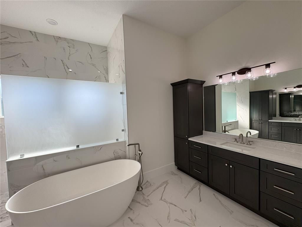 Bathroom, Dual Sink Vanities, Free Standing Baths, Interior, Marble, Marble Walls