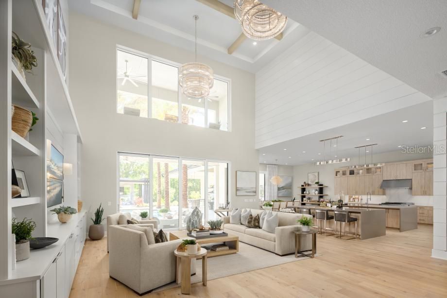 Chandelier, Interior, Kitchen, Living room, Pendant Lights, Recessed Lighting, Stainless Steel Appliances, Wood Texture Flooring