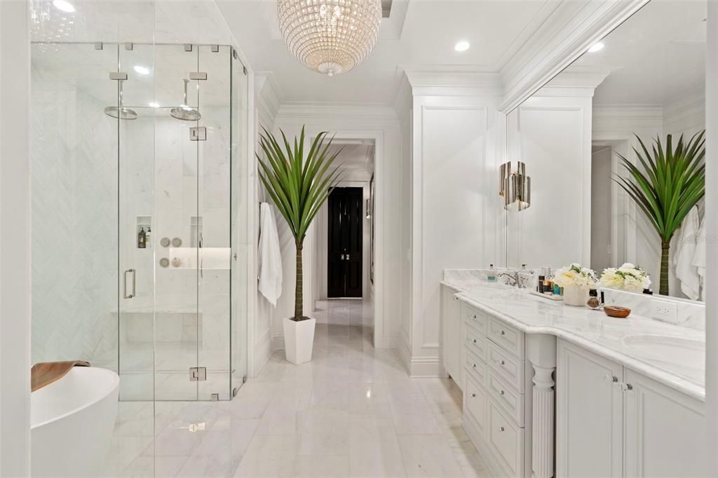 Bathroom, Chandelier, Dual Sink Vanities, Free Standing Baths, Glass Shower, Interior, Marble, Marble Walls, Recessed Lighting