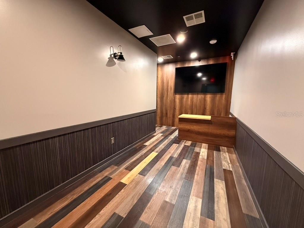 Interior, Projection Screen, Recessed Lighting, Theatre Room, Wood Texture Flooring, Wooden Walls