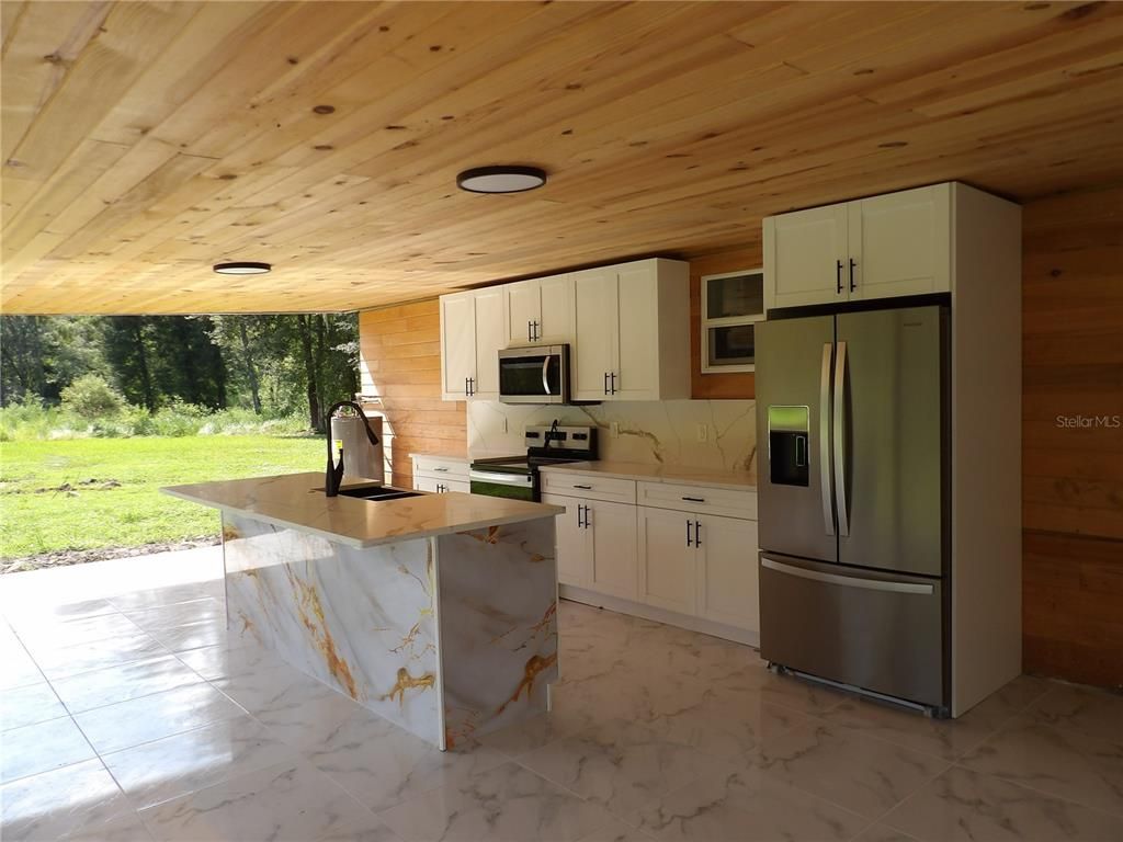 Interior, Kitchen, Marble, Recessed Lighting, Stainless Steel Appliances, Wooden Ceilings