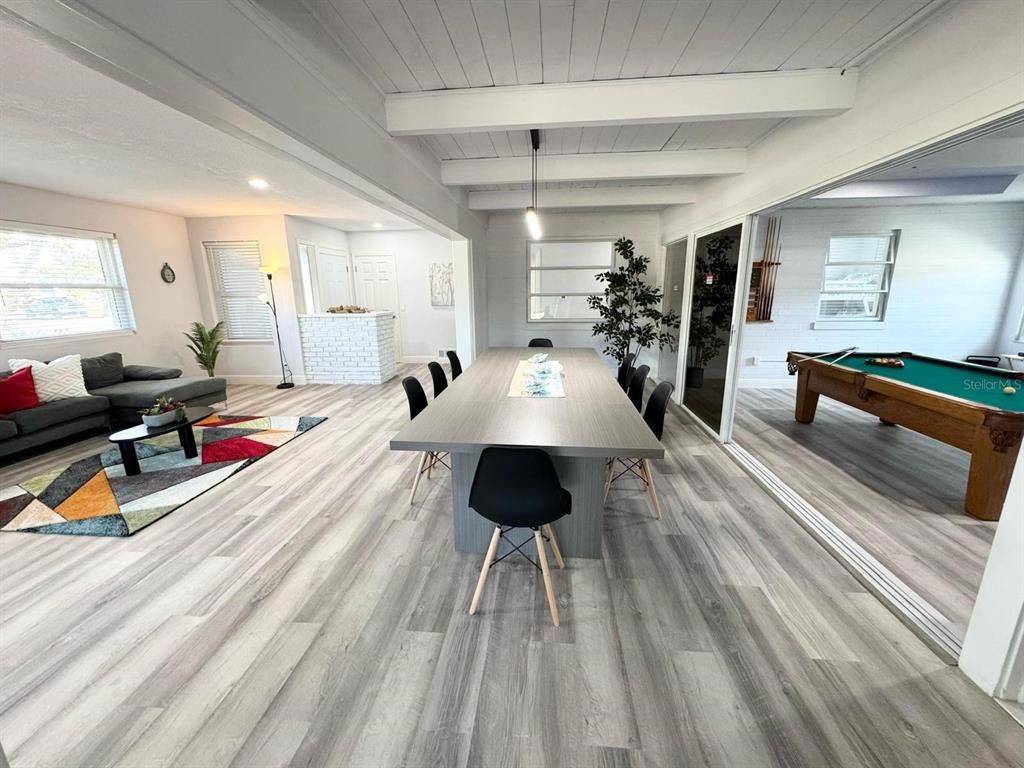 Billiard Table, Dining room, Game Room, Interior, Living room, Pendant Lights, Recessed Lighting, Wood Texture Flooring