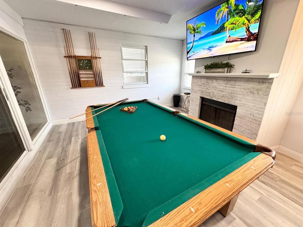 Billiard Table, Fireplace, Game Room, Interior, Stone Walls, Wood Texture Flooring