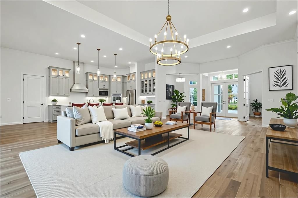 Chandelier, Interior, Kitchen, Living room, Pendant Lights, Recessed Lighting, Stainless Steel Appliances, Wood Texture Flooring