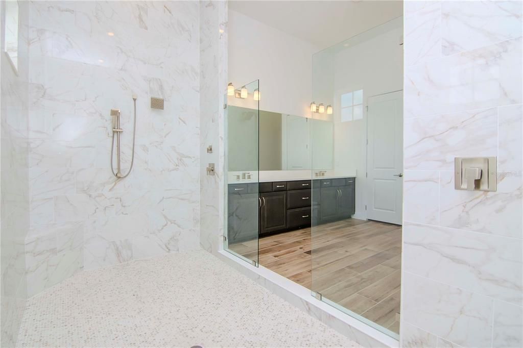 Bathroom, Glass Shower, Interior, Marble Walls, Wood Texture Flooring