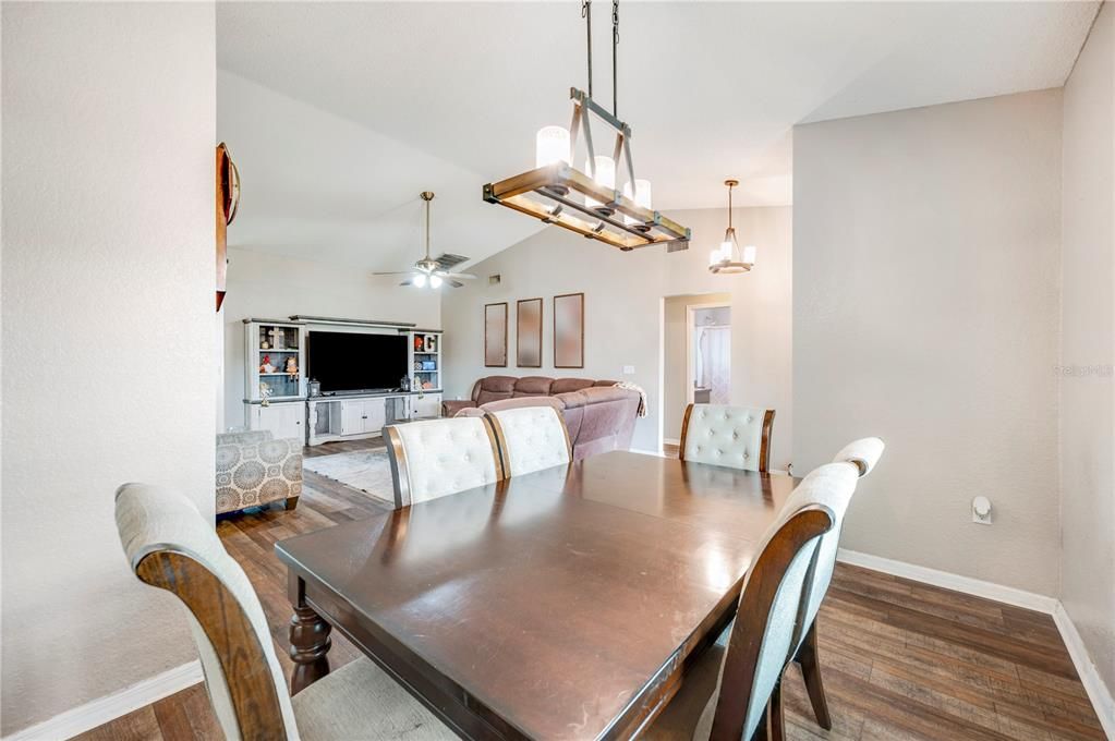 Dining room, Interior, Living room, Pendant Lights, Wood Texture Flooring