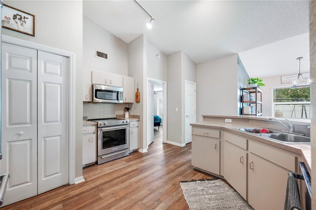 Interior, Kitchen, Pendant Lights, Stainless Steel Appliances, Wood Texture Flooring