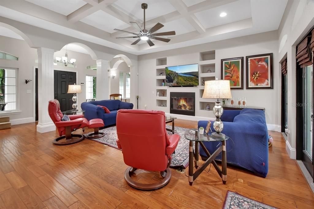 Fireplace, Interior, Living room, Recessed Lighting, Wood Texture Flooring